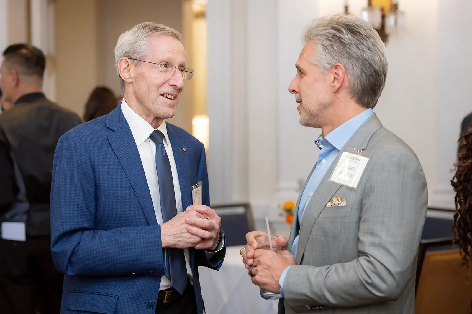 Bryan Rogoff in conversation at a glaucoma industry event
